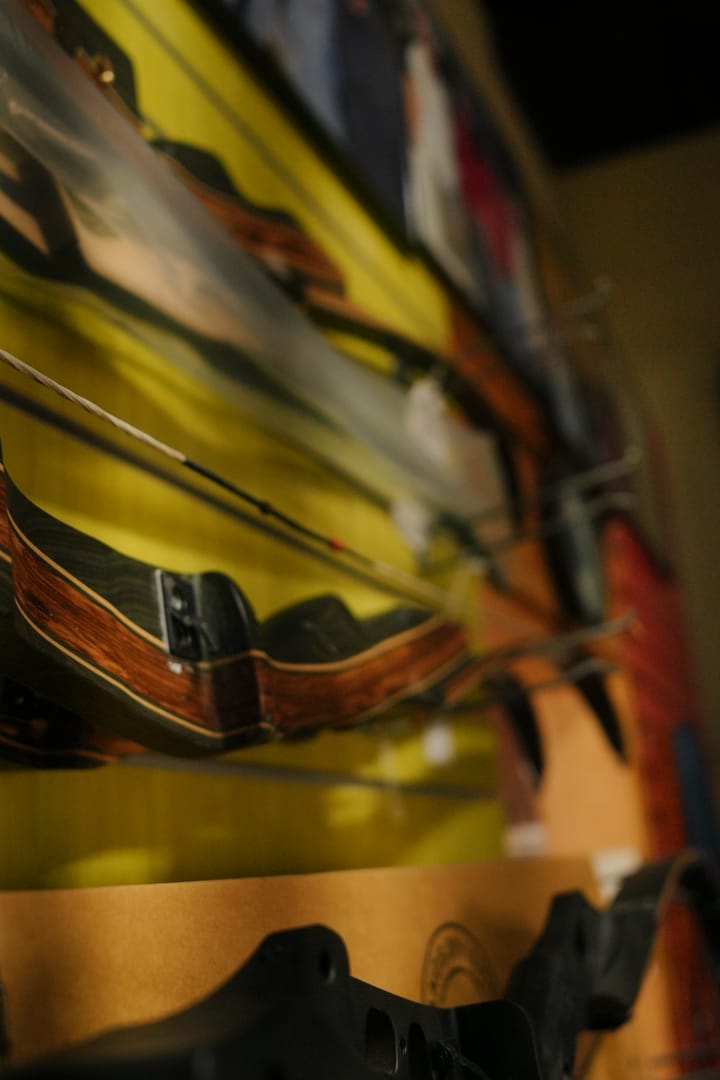 Traditional recurve bows on the wall